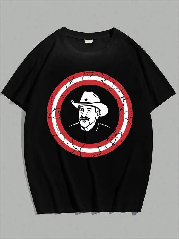 Black T-shirt with stylized cowboy illustration inside cracked red-white-blue shield emblem