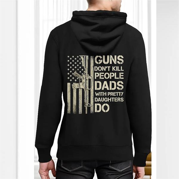 Back view of black hoodie featuring a stylized American flag with a rifle overlay and bold text reading “Guns don’t kill people. Dads with pretty daughters do.”