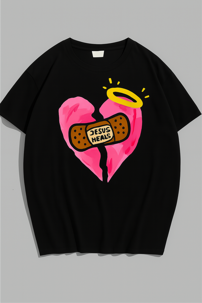 
                  
                    Jesus Heals Shirt – Broken Heart Christian Tee with Halo & Bandage Graphic
                  
                