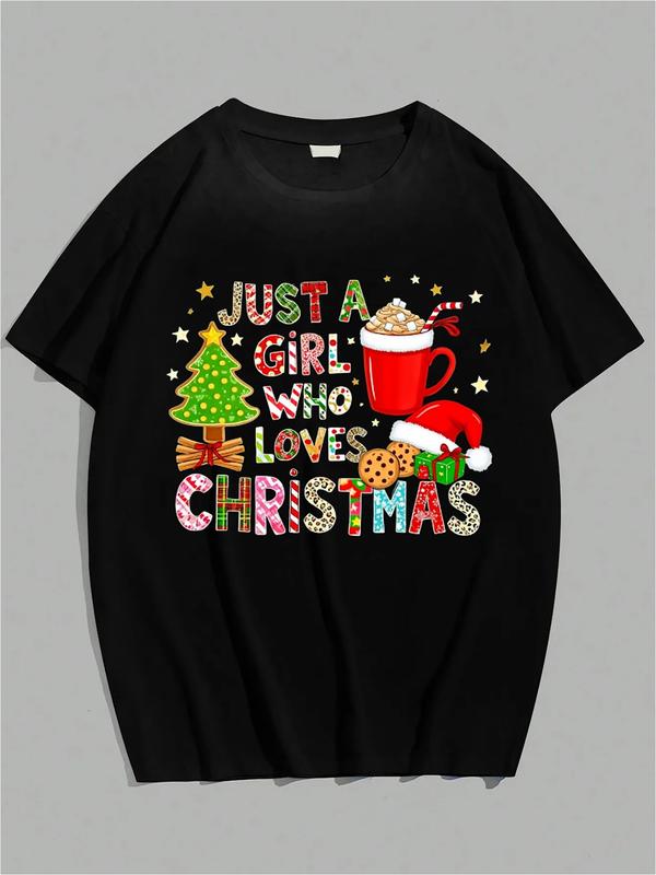Front view of black T-shirt with colorful “Just a Girl Who Loves Christmas” text and festive holiday graphics including tree, cocoa mug, Santa hat, and stars