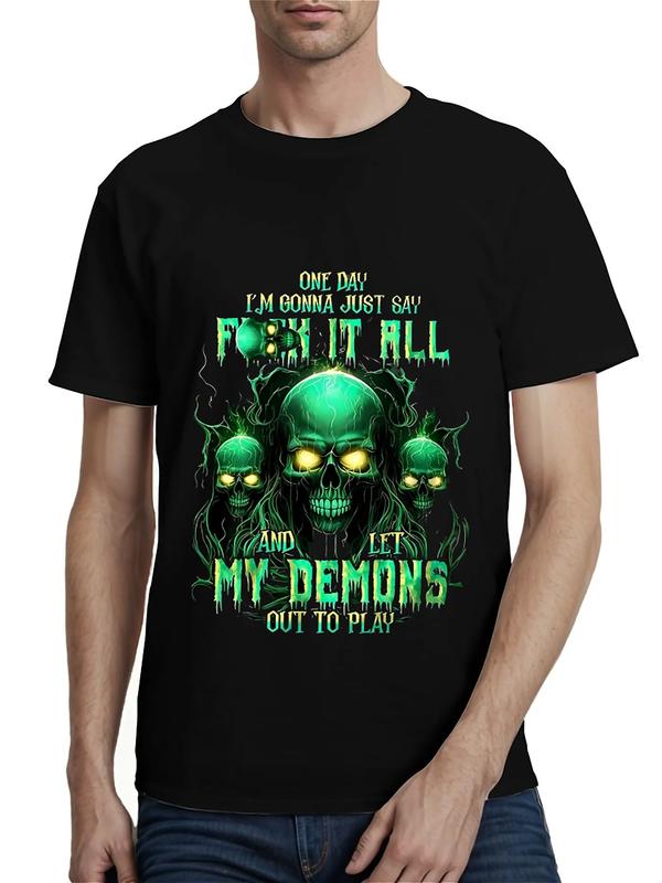 Black T-shirt featuring three glowing green skulls surrounded by flames and smoke, with bold green and white text reading “One day I’m gonna just say F**k it all and let my demons out to play”
