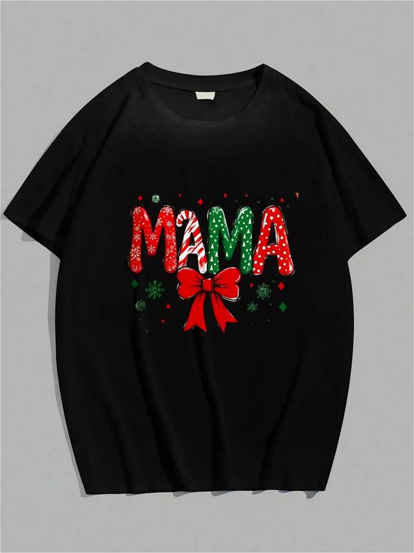 Black T-shirt with colorful “MAMA” lettering in Christmas patterns, red bow, green snowflakes, and festive accents