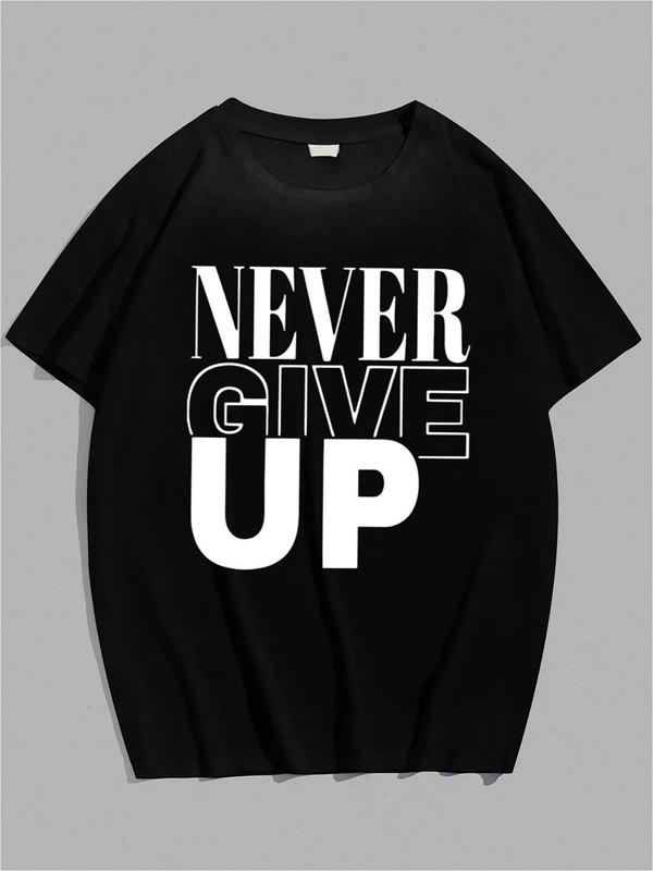Black T-shirt featuring bold white text reading “NEVER GIVE UP” with a mix of solid and outlined uppercase fonts