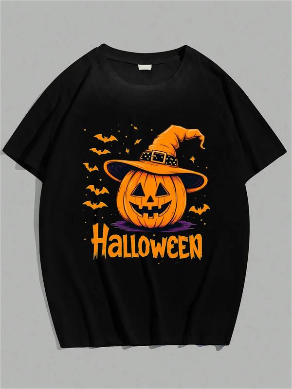 Black T-shirt with a Halloween-themed graphic featuring a smiling carved pumpkin wearing a purple witch hat, surrounded by bats and the word “HALLOWEEN” in bold orange letters