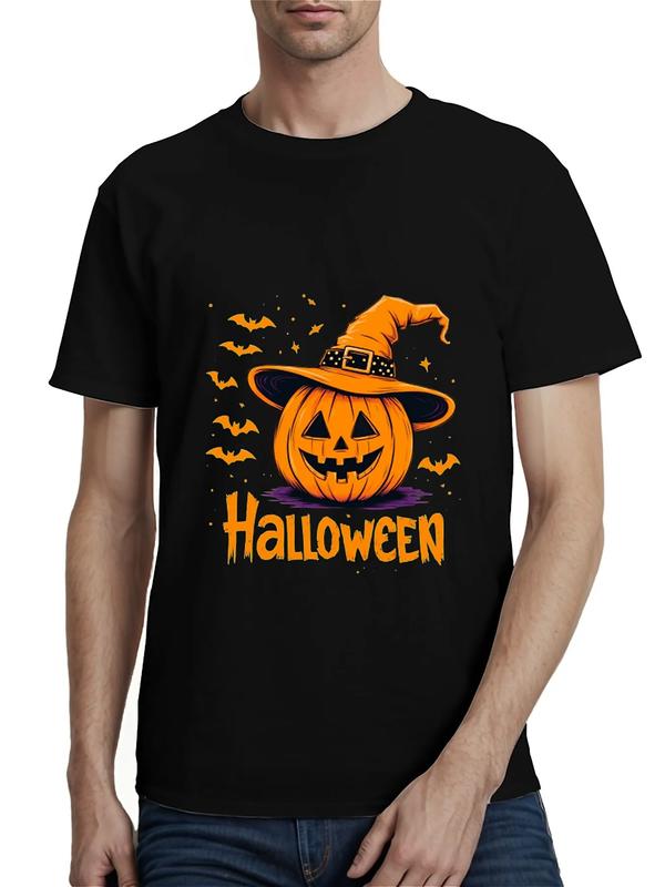 Black T-shirt with a Halloween-themed graphic featuring a smiling carved pumpkin wearing a purple witch hat, surrounded by bats and the word “HALLOWEEN” in bold orange letters