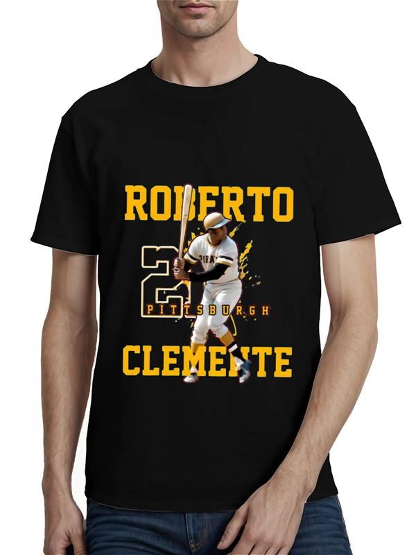 Black T-shirt featuring Roberto Clemente in a batting stance, with bold yellow text “ROBERTO CLEMENTE,” number 21 graphic, and “PITTSBURGH” across the design